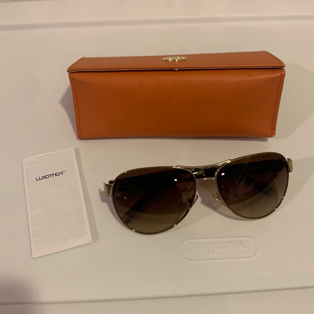 Tory Burch sunglasses. New but without tags. In original case